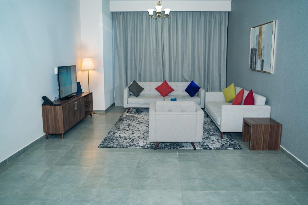 Luxe Grand Hotel Apartments Şarja Dış mekan fotoğraf A living room