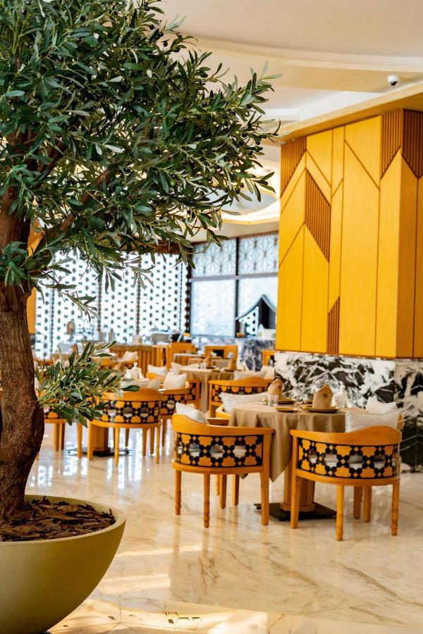 Luxe Grand Hotel Apartments Şarja Dış mekan fotoğraf The restaurant